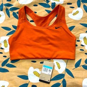 Nike Swoosh Dry-Fit racer back bra top in orange
